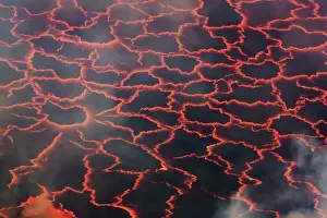 Black Prints: Lava lake Nyiragongo with glowing lava meltings - Congo, Democratic Republic, North Kivu