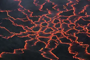 Black Prints: Lava lake Nyiragongo with glowing lava meltings - Congo, Democratic Republic, North Kivu