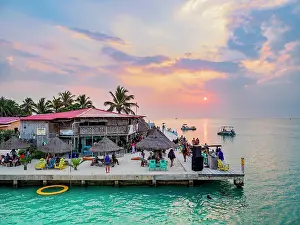Ferry Prints: The Lazy Lizard Bar and Grill at sunset, The Split, Caye Caulker, Belize District, Belize