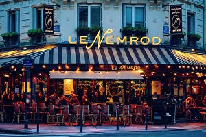 Images Dated 9th February 2023: Le Nemrod illuminated after sunset. Typical Cafe Restaurant in Paris, France