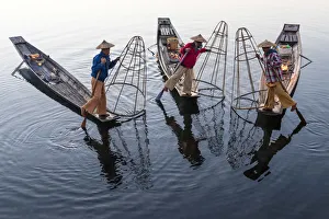 Leg-rowing fisherman of Inle Lake at dawn, Shan State, Myanmar