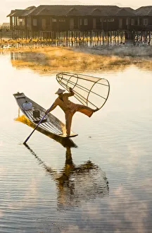 Leg-rowing fisherman of Inle Lake in the morning mist, Shan State, Myanmar