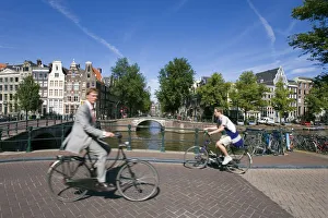 Riding A Bike Prints: Leidsegracht, Herengracht, Amsterdam, the Netherlands