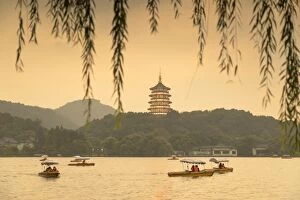 Oriental Flavours Collection: Leifeng Pagoda at dusk, West Lake (UNESCO World Heritage Site), Hangzhou, Zhejiang, China