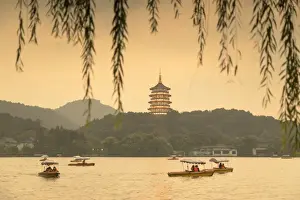 Leifeng Pagoda at dusk, West Lake (UNESCO World Heritage Site), Hangzhou, Zhejiang, China