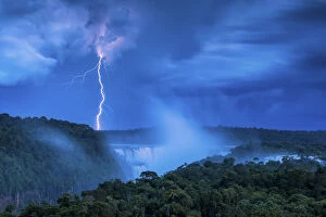 Storm Clouds Collection: Lightening Strike over Iguazu Falls, Argentina, South America
