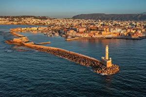 South East Europe Collection: Lighthouse at the old Ventian harbour, Chania, Crete, Greek Islands, Greece