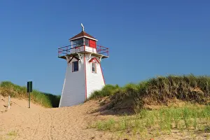 Maritime Province Prints: Lighthouse in sand dunes at Covehead Harbour Prince Edward Island, Canada