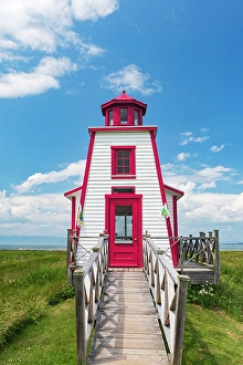 Lighthouse on the shore of the lower St. Lawrence Gulf, Saint-Andre-de-Kamouraska, Quebec, Canada