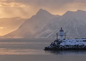 Snowy Peaks Prints: A lighthouse in the snow, Vesteralen Island Norway