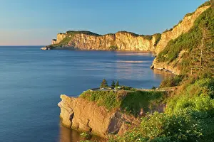 Foreground Prints: Limestone rcok along Cap Gaspe (background) from Cap-Bon-Ami in foreground Forillon National Park Quebec