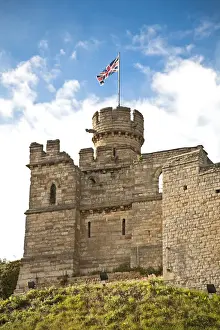 Midlands Prints: Lincoln, England. The Union Jack flies from the tower of Lincoln castle