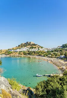 Images Dated 10th January 2023: Lindos Beach and The Acropolis of Lindos, Lindos, Dodecanese Islands, Greece