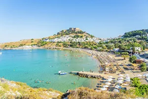 Images Dated 10th January 2023: Lindos Beach and The Acropolis of Lindos, Lindos, Dodecanese Islands, Greece