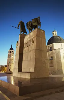 Lithuania, Vilnius, Vilnius Cathedral Bell Tower And Statue Of Gediminas At Dusk