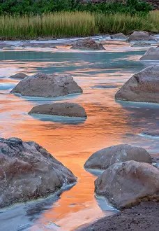 Flowing Water Prints: Little Colorado River- mineral-laden water with canyon wall reflections at dawn