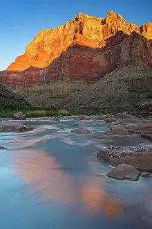 Flowing Water Prints: Little Colorado River- mineral-laden water with canyon wall reflections at dawn