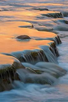 Flowing Water Prints: Little Colorado River- mineral-laden water flowing over traverrtine terraces at dawn