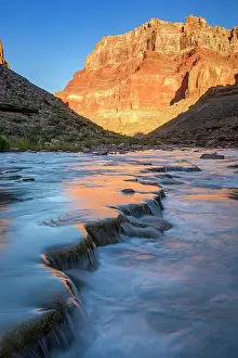 Fresh Water Prints: Little Colorado River- mineral-laden water flowing over traverrtine terraces at dawn