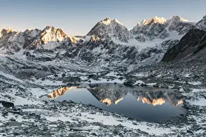 Mirrored Prints: The little lake of Forbici during sunrise and in background Bernina Group, Valmalenco