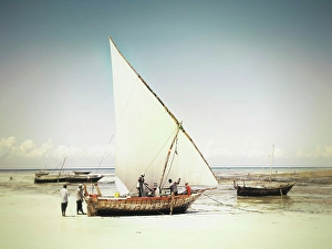 Dhow Prints: Local fishermen preparing their dhow for a fishing trip out at sea