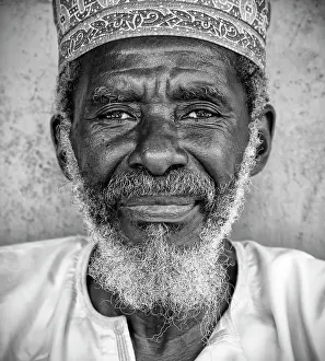 B And W Prints: Local man wearing a Kofia (traditional hat), Stonetown, Zanzibar, Tanzania, Africa