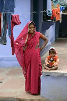 Images Dated 4th June 2013: Local woman and her child in City of Karauli, Rajasthan, India