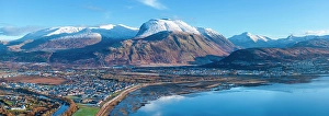 Highland Region Prints: Loch Eli with snow capped Ben Nevis and Fort William