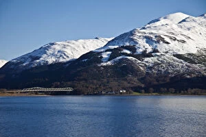 Images Dated 10th June 2011: Loch Linnhe, Scotland. The sun snow covered peaks of Beinn a Bheithir behind