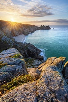 Logan Rock Prints: Logan Rock and Pedn Vounder beach at sunrise