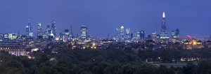 London skyline with the Shard above Hyde Park, London, England, UK