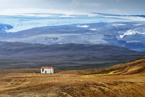Rugged Peak Prints: A lone cabin overlooking a glacier near Kerlingalfjoll, Iceland