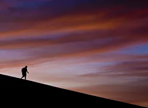 Sahara Prints: Lone figure on dune, Erg Chigaga, Sahara Desert, Morocco, Africa