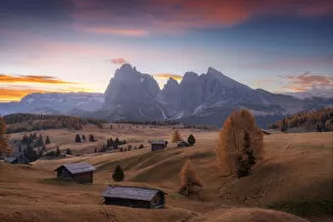 The lonely cabins of the Alpe di Siusi (Seiser Alm) during a peaceful autumn morning
