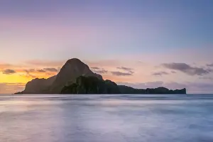 Long exposure of Cadlao Island on Bacuit Bay at sunset seen from Caalan Beach, El Nido