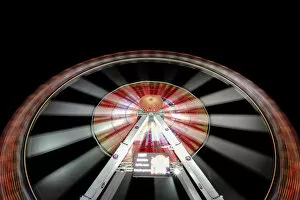 Images Dated 13th August 2014: Long exposure of illuminated ferris wheel at Hamburger DOM funfair at night, St. Pauli
