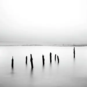 Northumberland Prints: Long exposure image, old wooden posts, Holy Island, Lindisfarne, Northumberland, England