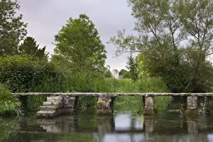 Looking towards Eastleach Turville Church from the stone clapper bridge crossing