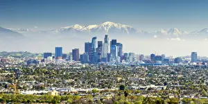 Los Angeles Skyline and Snow Capped San Gabriel Mountains, California, USA