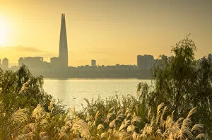 Images Dated 25th February 2020: Lotte World Tower and Nam River at sunrise, Seoul, South Korea