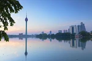 Images Dated 10th June 2019: Lotus Tower on Beira Lake at sunrise, Colombo, Sri Lanka