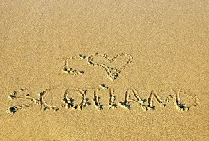 Word Prints: Love Scotland message on the sand