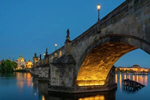 Images Dated 14th July 2023: Low angle view of Charles Bridge at twilight, Prague, Bohemia, Czech Republic