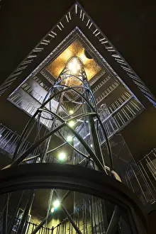 Old Town Hall Prints: Low angle view of elevator inside Old Town Hall and Prague Astronomical Clock