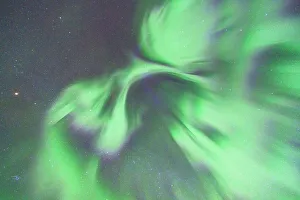 Aurora Borealis Prints: Low angle view of the scenic sky during the Northern Lights