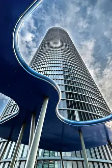 Madrid Prints: Low angle view of Torre PwC, Cuatro Torres Business Area, Madrid, Spain