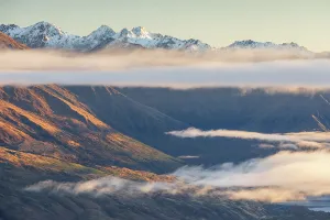 Southern Alps Prints: Low clouds hang beneath the Southern Alps near Wanaka