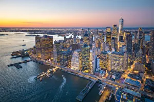 East River Prints: Lower Manhattan, New York City, USA. Aerial view of the Financial District at dusk