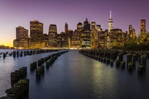 Lower Manhattan skyline at dusk from Brooklyn Bridge Park, Brooklyn, New York, USA