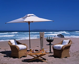 Outdoor Dining Prints: Lunch set up on Keurboom Beach for guests at The Plettenberg
